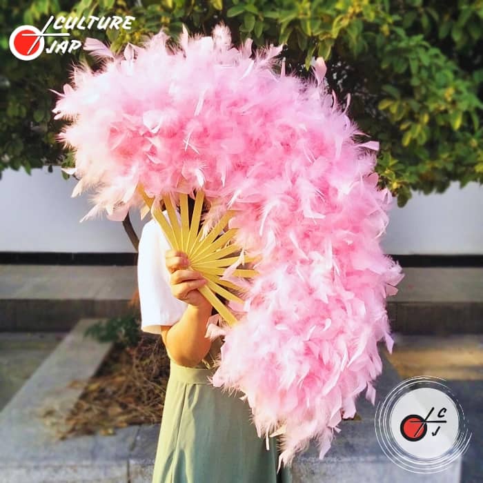 éventail haut de gamme en plume rose